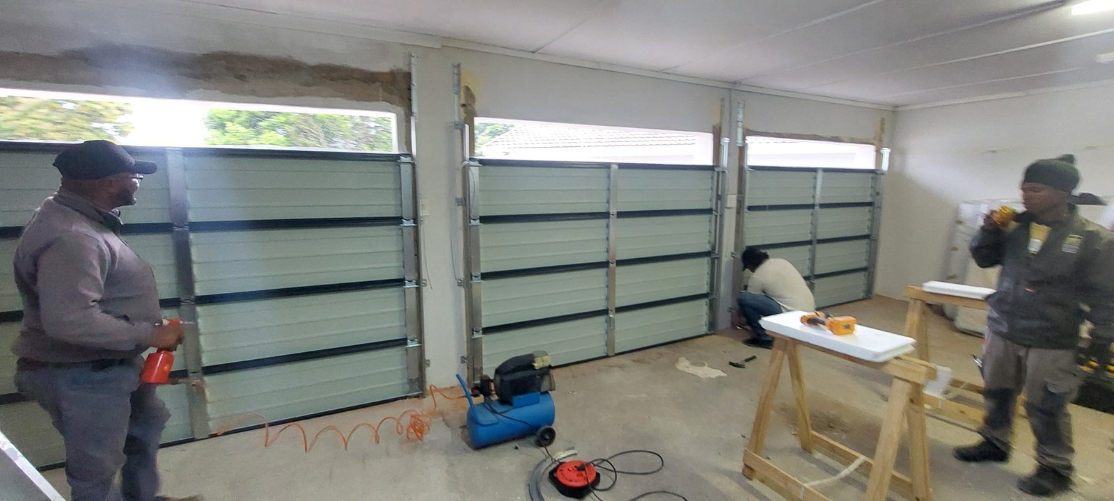 Garage door installation in progress