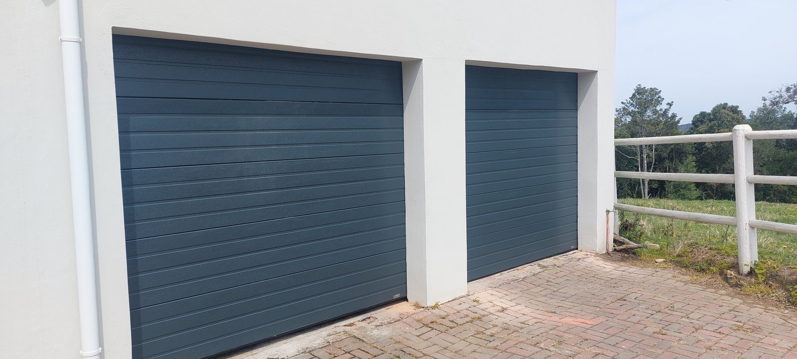 Contemporary charcoal garage doors